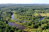 10 - high view of property facing northwest - pond and river in view